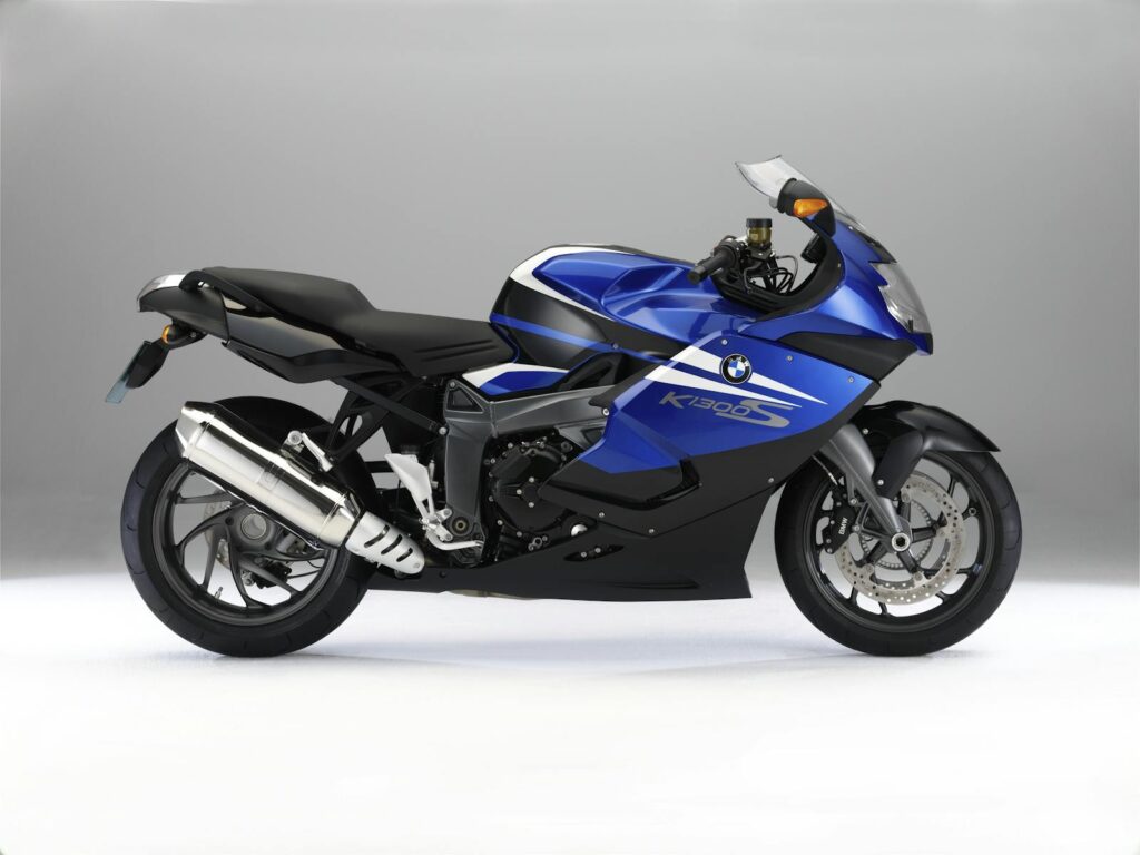 Blue K1300S motorcycle side view showcasing sleek design and technology.